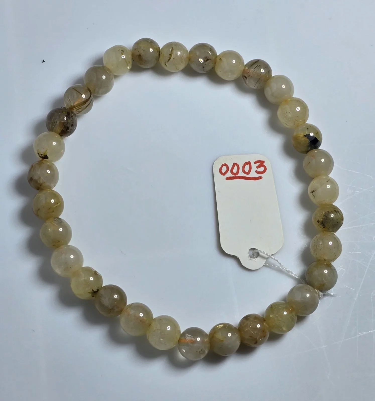 Golden Rutilated Quartz (ไหมเศรษฐี)