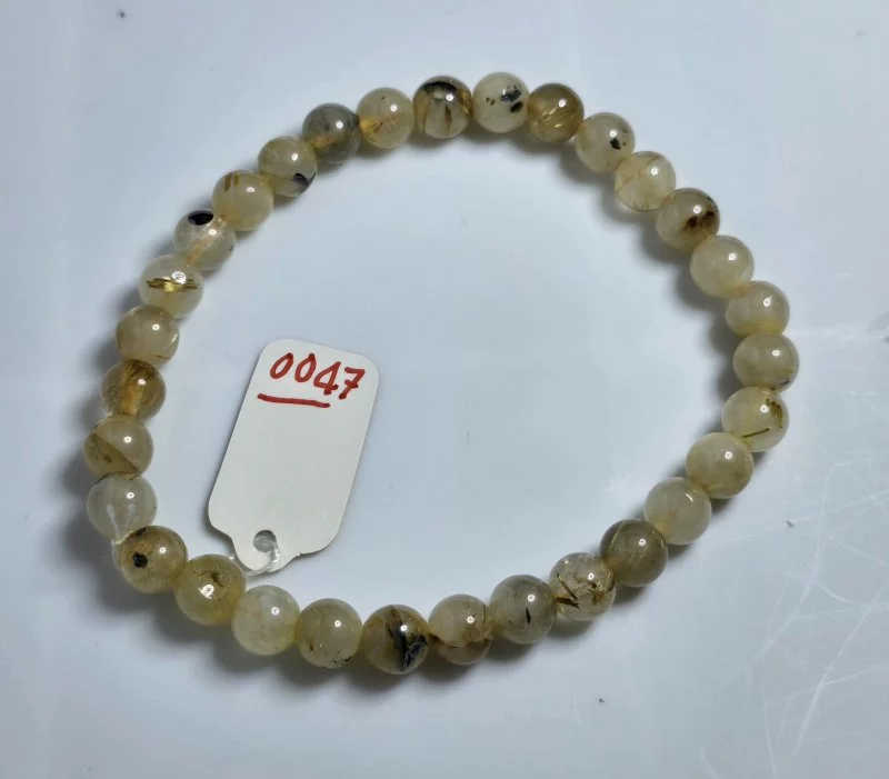 Golden Rutilated Quartz (ไหมเศรษฐี)