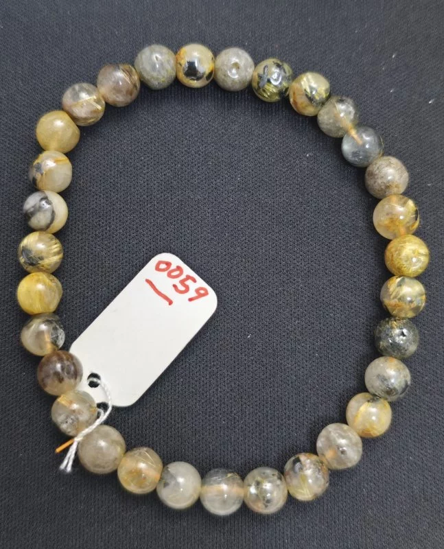 Golden Rutilated Quartz (ไหมเศรษฐี)