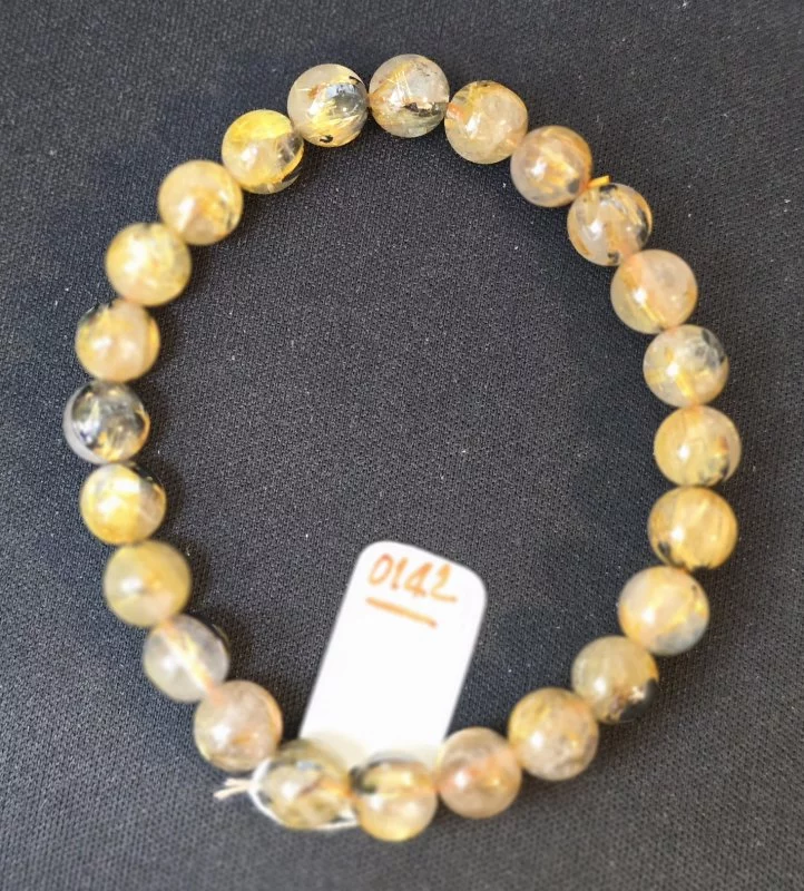 Golden Rutilated Quartz (ไหมเศรษฐี)