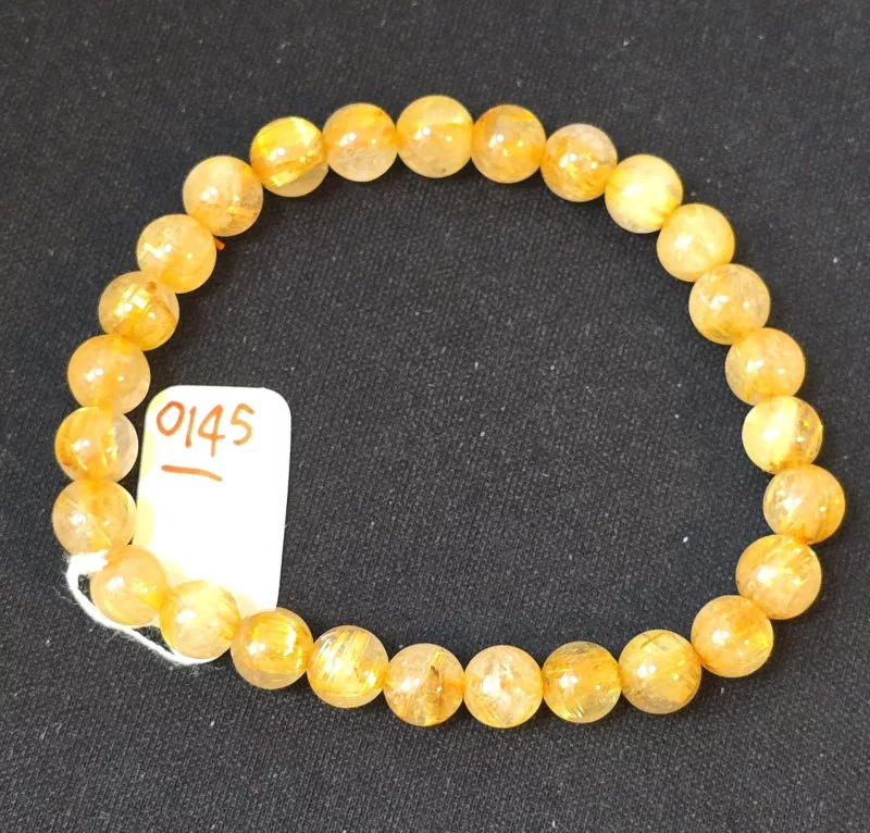 Golden Rutilated Quartz (ไหมเศรษฐี)