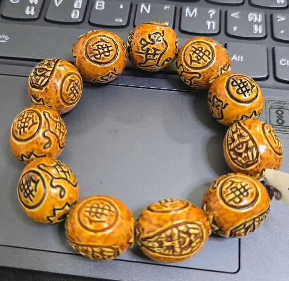 Auspicious Carved Wood (ไม้แกะมงคล)