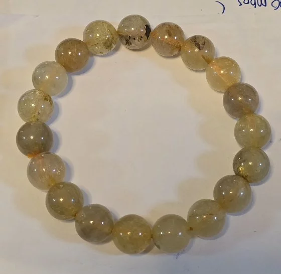 Golden Rutilated Quartz (ไหมเศรษฐี)