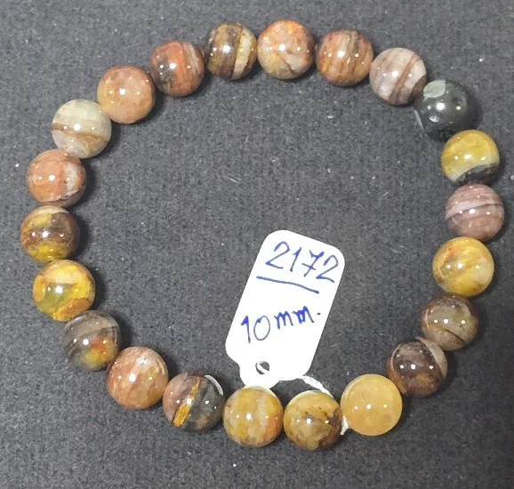 Apricot Pietersite (แอพริคอท ปีเตอร์ไซต์)